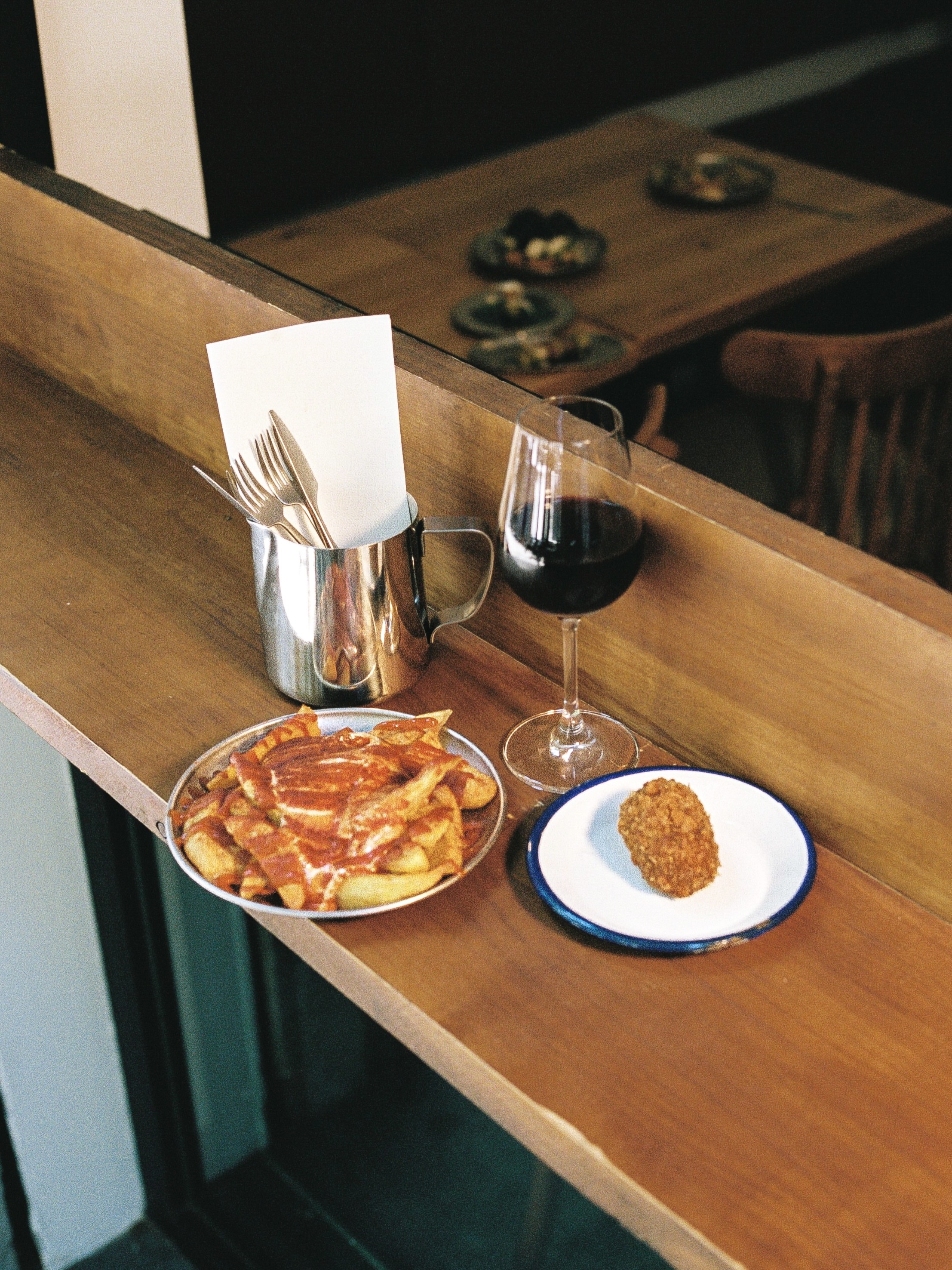 Tables in the dining room at El Cuadrat