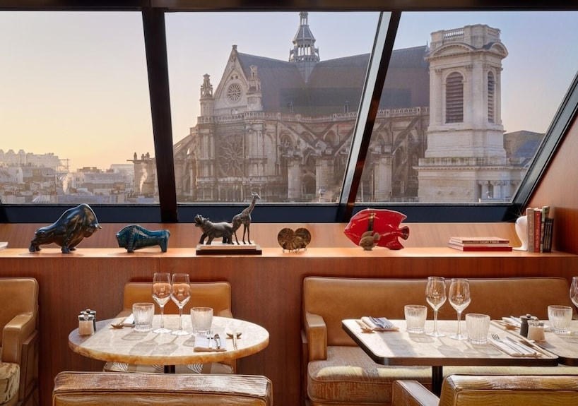 Dining tables at Hôtel Madame Rêve