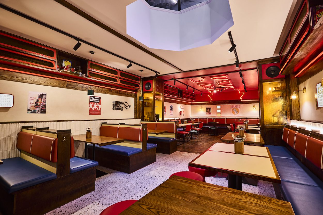 The dining room at Tangra, warm light and banquettes on Frith Street